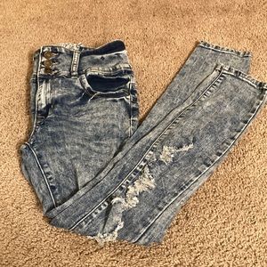 Distressed high rise skinny jeans